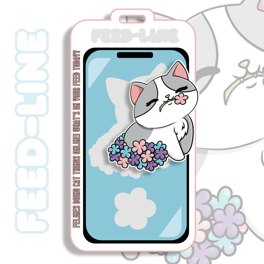 Feedline - Felines doing cat things online. Gray and White Cat Cherry blossom bed.