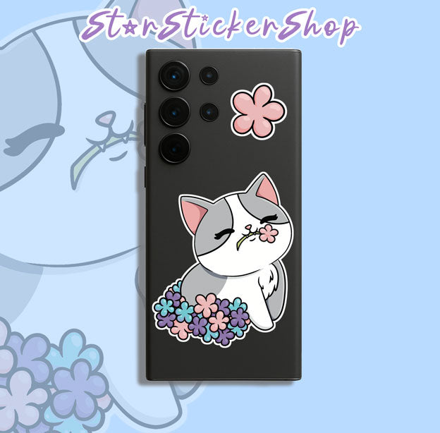 Feedline - Felines doing cat things online. Gray and White Cat Cherry blossom bed.